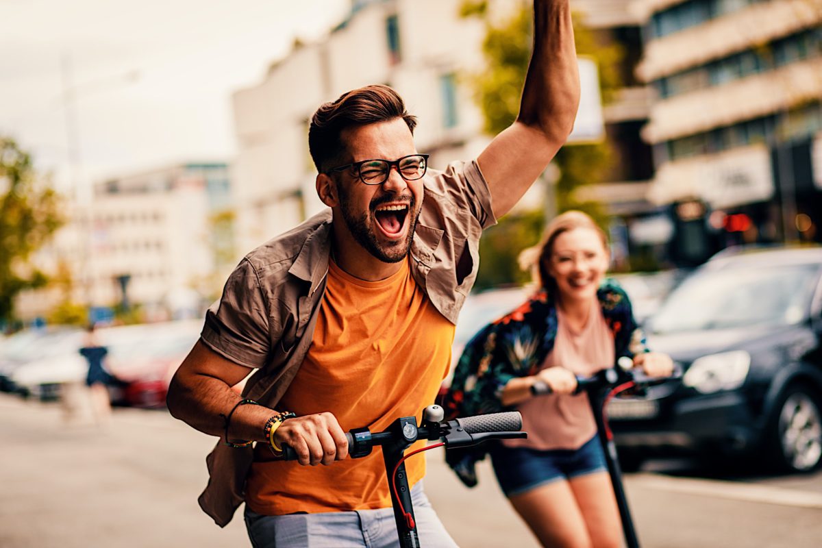 couple on electric scooter