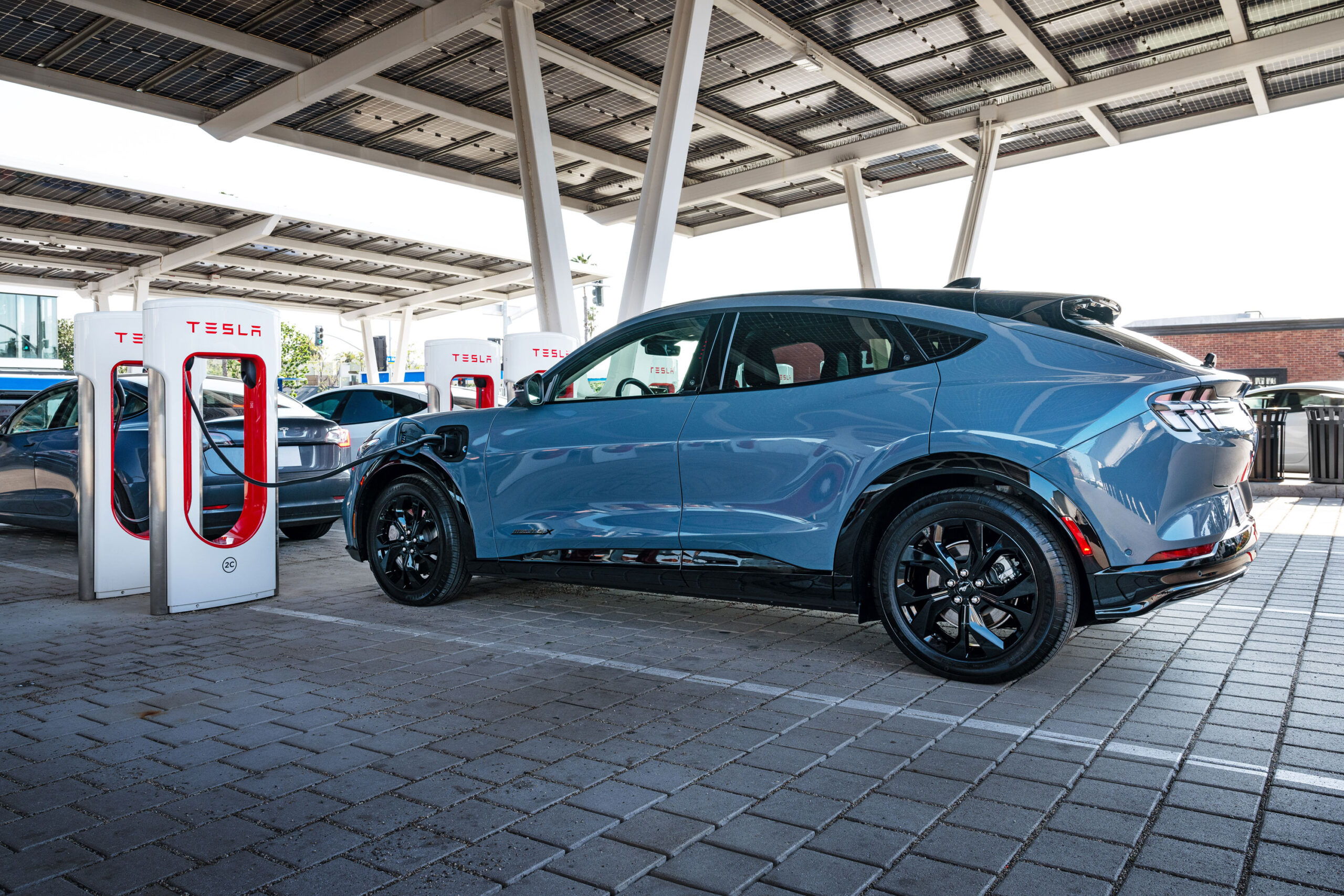 FINALLY! Tesla Superchargers can now juice up Ford EVs - EV Pulse